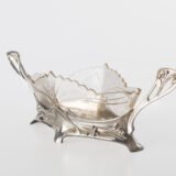 WMF silver plated centerpiece with glass insert, 1900. This centerpiece is a classic example of the Art Nouveau style. Manufactured by the prestigious German firm WMF circa 1900, it is a testament to the design of the period.