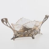 WMF silver plated centerpiece with glass insert, 1900. This centerpiece is a classic example of the Art Nouveau style. Manufactured by the prestigious German firm WMF circa 1900, it is a testament to the design of the period.