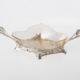 WMF silver plated centerpiece with glass insert, 1900. This centerpiece is a classic example of the Art Nouveau style. Manufactured by the prestigious German firm WMF circa 1900, it is a testament to the design of the period.