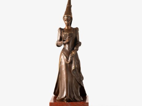 Art Nouveau bronze and red marble sculpture “Châtelaine XIV S”. Beautiful Art Nouveau bronze sculpture titled “Châtelaine XIV S”, 14th century Lady of the castle. It depicts a Lady of the Middle Ages with headdress and long-tailed dress walking absorbed reading a book. She stands on a stepped pedestal of red marble