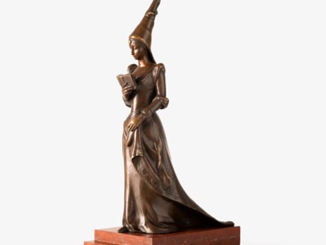 Art Nouveau bronze and red marble sculpture “Châtelaine XIV S”. Beautiful Art Nouveau bronze sculpture titled “Châtelaine XIV S”, 14th century Lady of the castle. It depicts a Lady of the Middle Ages with headdress and long-tailed dress walking absorbed reading a book. She stands on a stepped pedestal of red marble