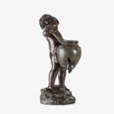 Sculpture by Auguste Moreau “Le pot cassé” 19th century A boy carries a large broken water pitcher pouring the contents, the green patinated pitcher is a small vase. The figure, a fine example of late 19th century French Art Nouveau, is finely cast in patinated technical zinc.