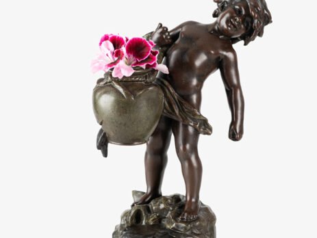 Sculpture by Auguste Moreau “Le pot cassé” 19th century A boy carries a large broken water pitcher pouring the contents, the green patinated pitcher is a small vase. The figure, a fine example of late 19th century French Art Nouveau, is finely cast in patinated technical zinc.