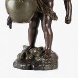 Sculpture by Auguste Moreau “Le pot cassé” 19th century A boy carries a large broken water pitcher pouring the contents, the green patinated pitcher is a small vase. The figure, a fine example of late 19th century French Art Nouveau, is finely cast in patinated technical zinc.