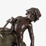 Sculpture by Auguste Moreau “Le pot cassé” 19th century A boy carries a large broken water pitcher pouring the contents, the green patinated pitcher is a small vase. The figure, a fine example of late 19th century French Art Nouveau, is finely cast in patinated technical zinc.