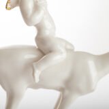 Karl Tutter 'Puto Auf Reh' Porcelain figurine 1920's High quality white enameled porcelain figurine with golden details, made by the prestigious artist Karl Tutter for the famous firm Hutschenreuther.