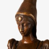 Art Nouveau bronze and red marble sculpture “Châtelaine XIV S”. Beautiful Art Nouveau bronze sculpture titled “Châtelaine XIV S”, 14th century Lady of the castle. It depicts a Lady of the Middle Ages with headdress and long-tailed dress walking absorbed reading a book. She stands on a stepped pedestal of red marble