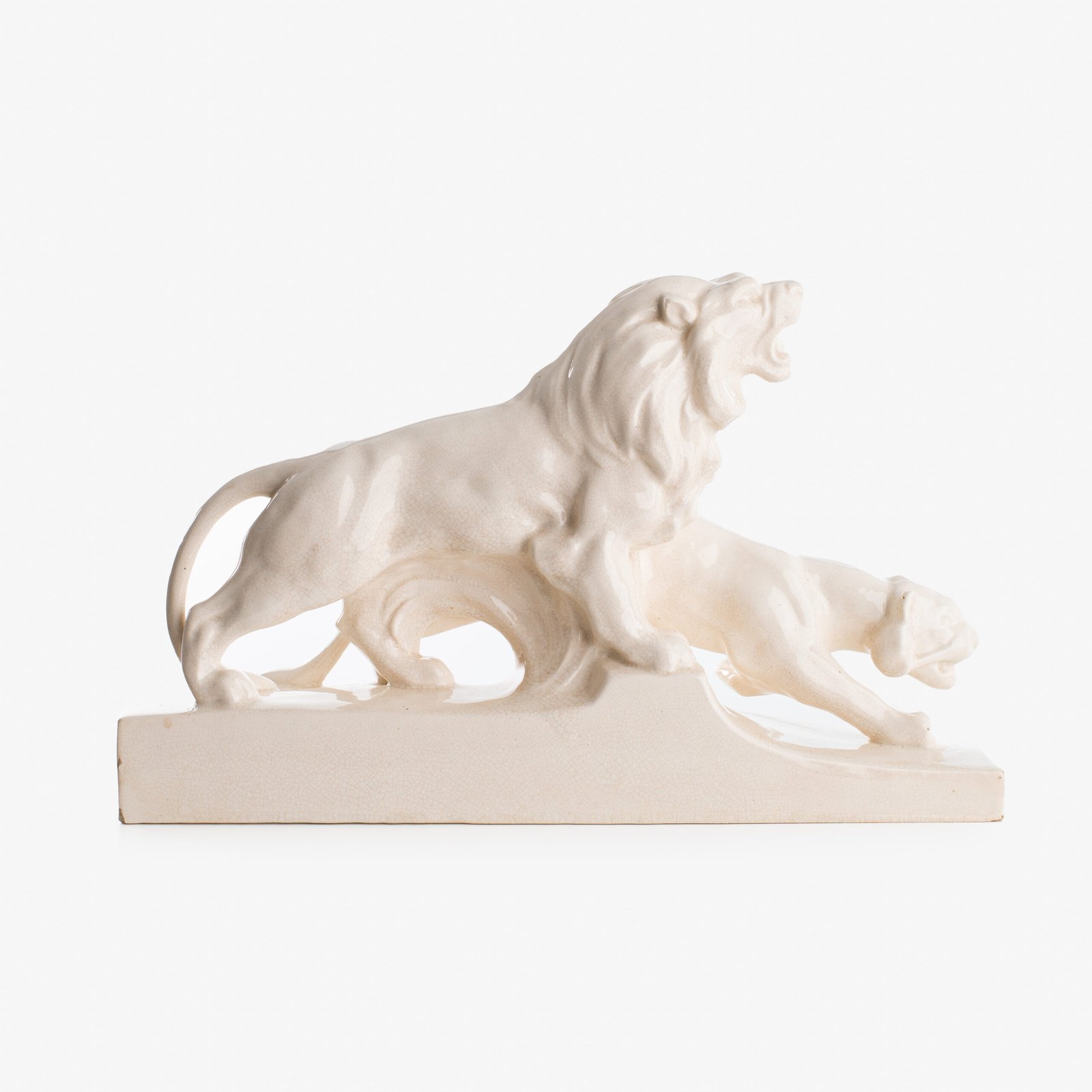 Crackle ceramic sculpture “Lion and Lioness” by L. Francois Great crackle white ceramic sculpture by the prestigious L. Francois. Made in France in the 30s of the last century by Saint-Clément. Dimensions Height 10.62 in Width 5.11 in Depth 18.5 in