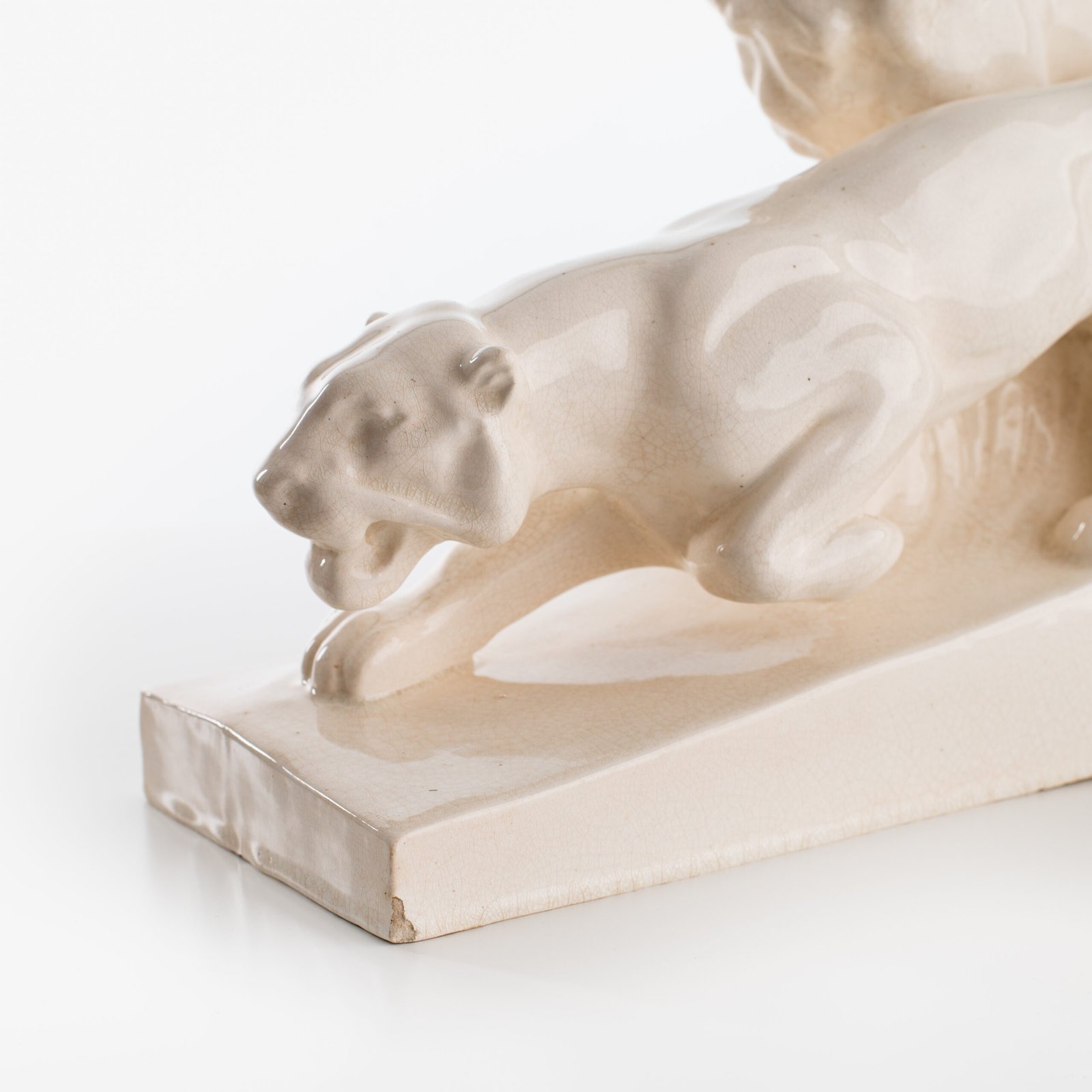 Crackle ceramic sculpture “Lion and Lioness” by L. Francois Great crackle white ceramic sculpture by the prestigious L. Francois. Made in France in the 30s of the last century by Saint-Clément. Dimensions Height 10.62 in Width 5.11 in Depth 18.5 in