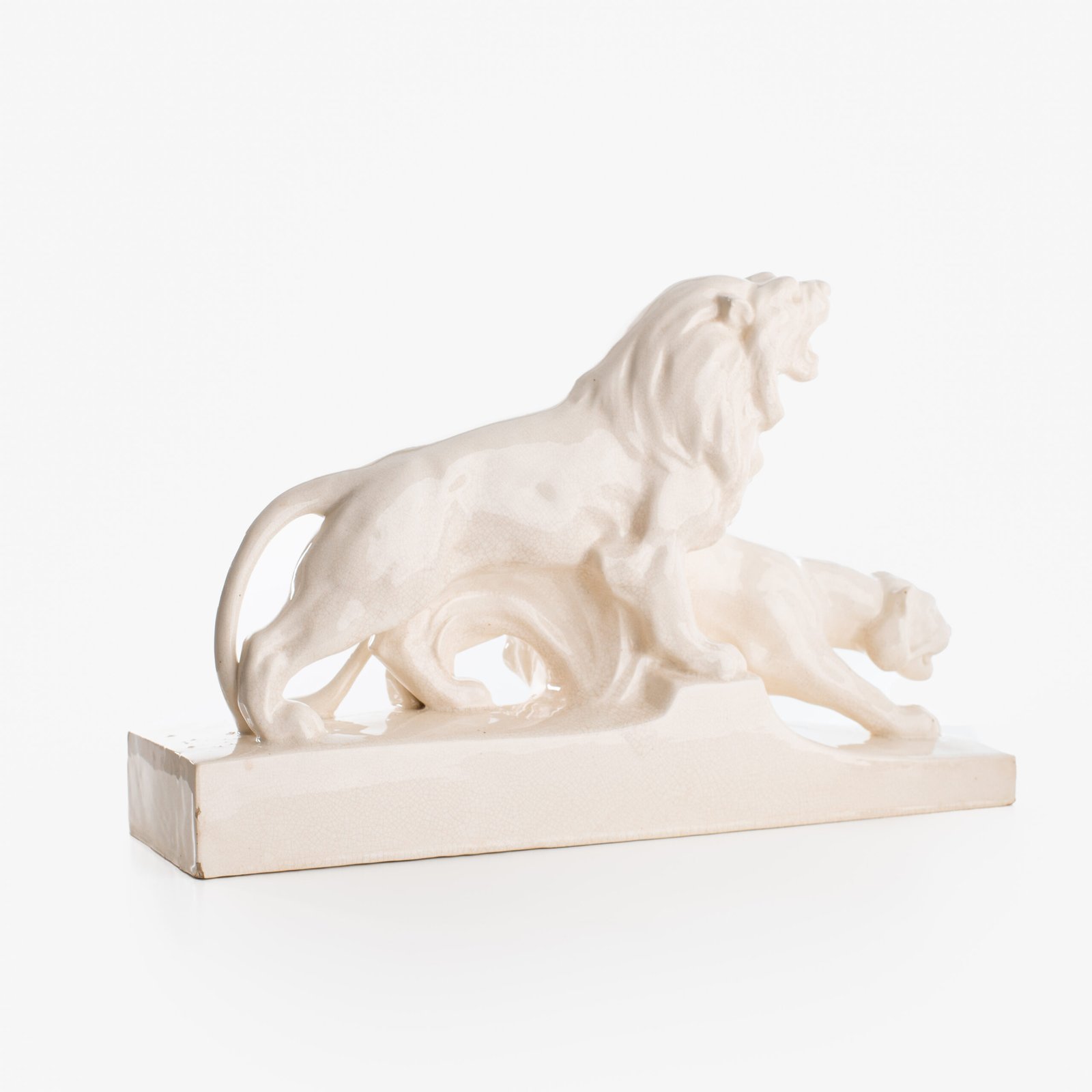 Crackle ceramic sculpture “Lion and Lioness” by L. Francois Great crackle white ceramic sculpture by the prestigious L. Francois. Made in France in the 30s of the last century by Saint-Clément. Dimensions Height 10.62 in Width 5.11 in Depth 18.5 in