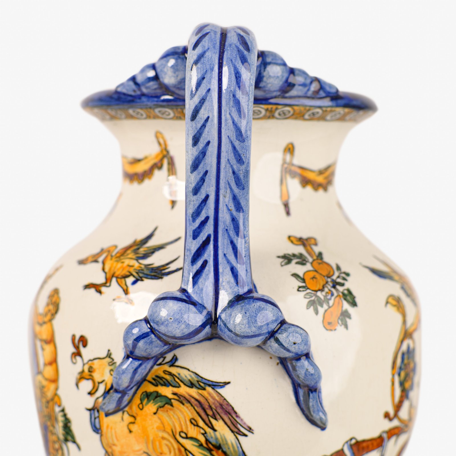 Gien faience vase, late 19th century, Renaissance decoration. Beautiful ceramic vase from the prestigious faiencerie Gien, France. Hand painted, it features a circa 1880 motif inspired by the Italian Renaissance.