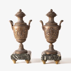 E. Picault pair of French cassolettes 19th century. Important mantelpiece that includes two elegant covered “cassolettes” vases, cast in spelter and patinated in brown and gilt bronze, second half of the 19th century.