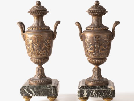 E. Picault pair of French cassolettes 19th century. Important mantelpiece that includes two elegant covered “cassolettes” vases, cast in spelter and patinated in brown and gilt bronze, second half of the 19th century.