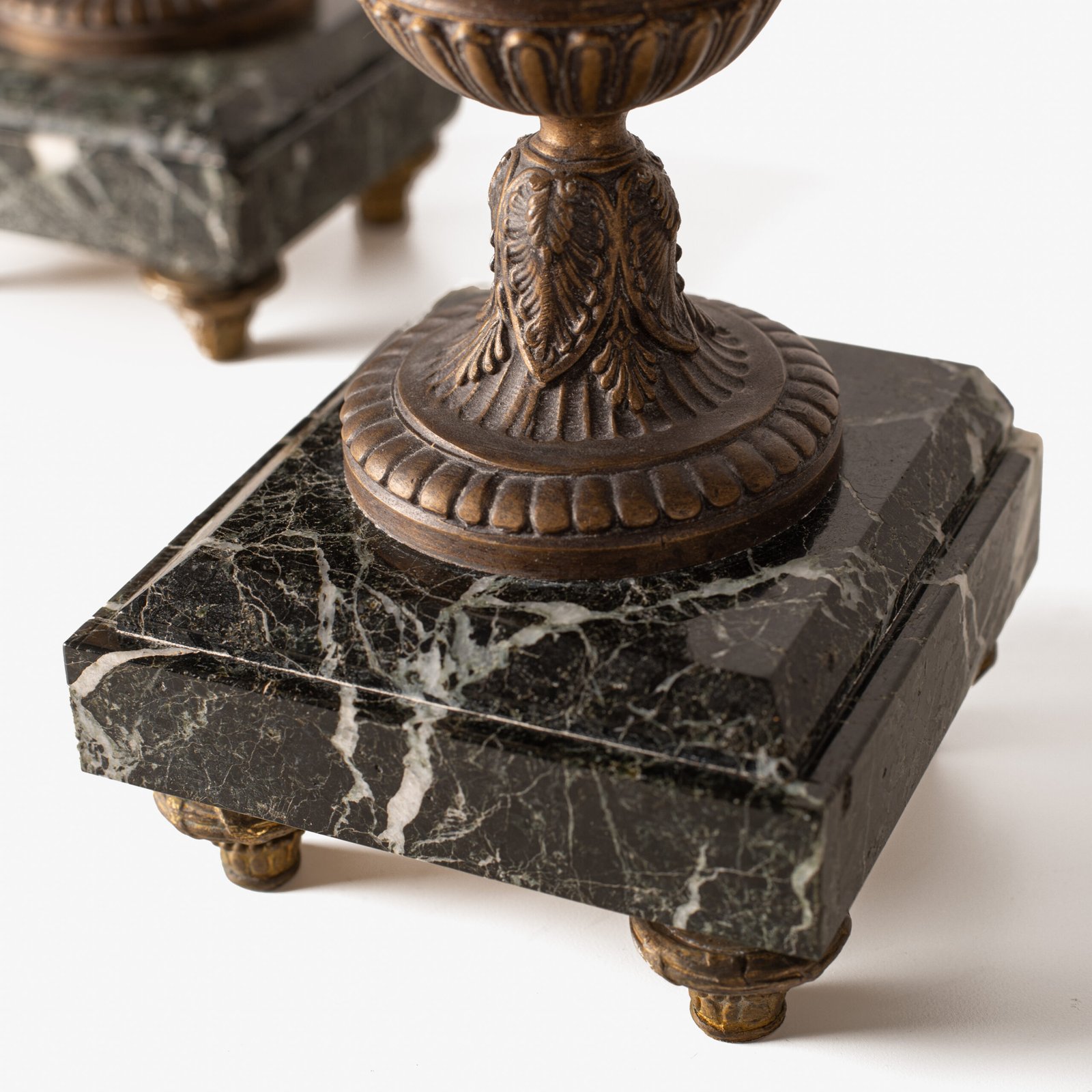 E. Picault pair of French cassolettes 19th century. Important mantelpiece that includes two elegant covered “cassolettes” vases, cast in spelter and patinated in brown and gilt bronze, second half of the 19th century.