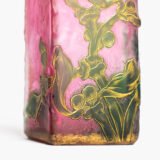 Made by the prestigious Daum Nancy glass factory in France, this vase is a testament to the craftsmanship and artistry of master glassmakers.