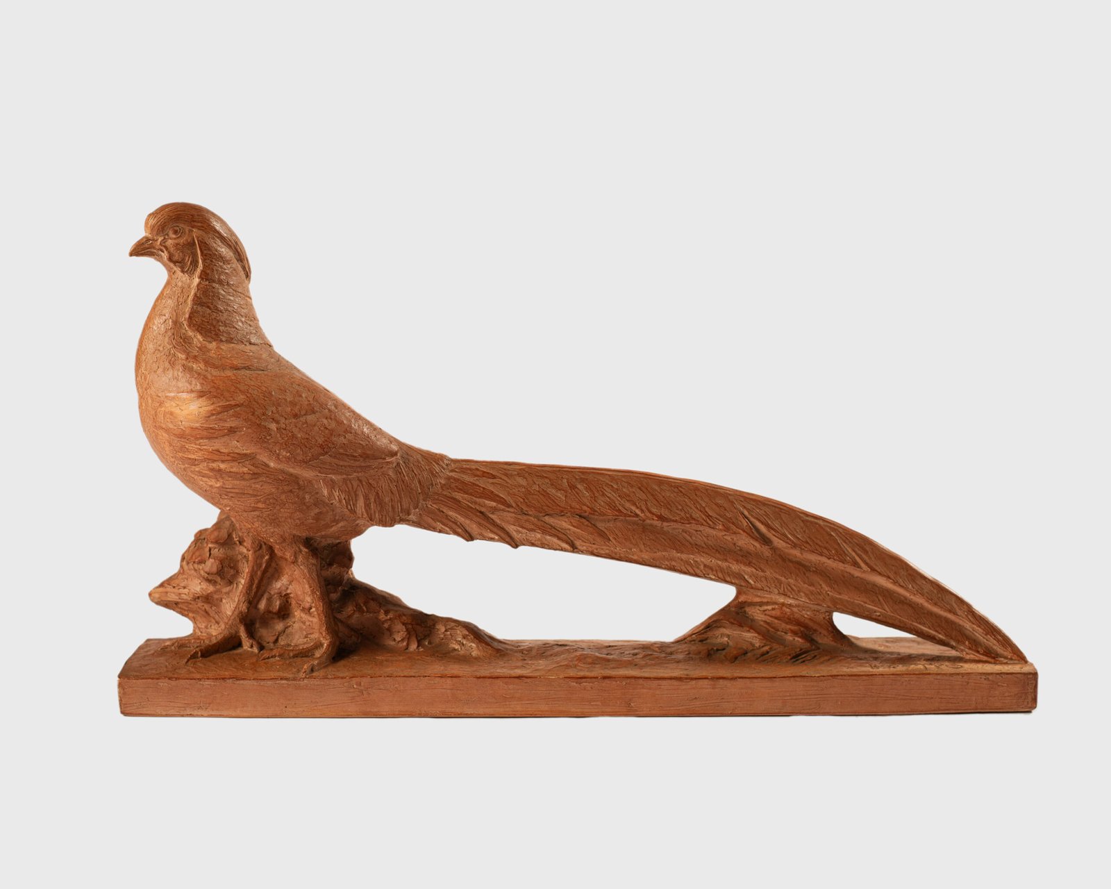 magnificent "Golden Pheasant" terracotta sculpture by Henri Bargas! Crafted by the renowned French sculptor in the 1920s, this stunning piece encapsulates the essence of Art Deco.