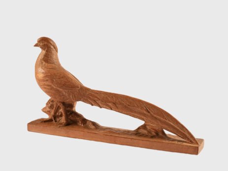 magnificent "Golden Pheasant" terracotta sculpture by Henri Bargas! Crafted by the renowned French sculptor in the 1920s, this stunning piece encapsulates the essence of Art Deco.