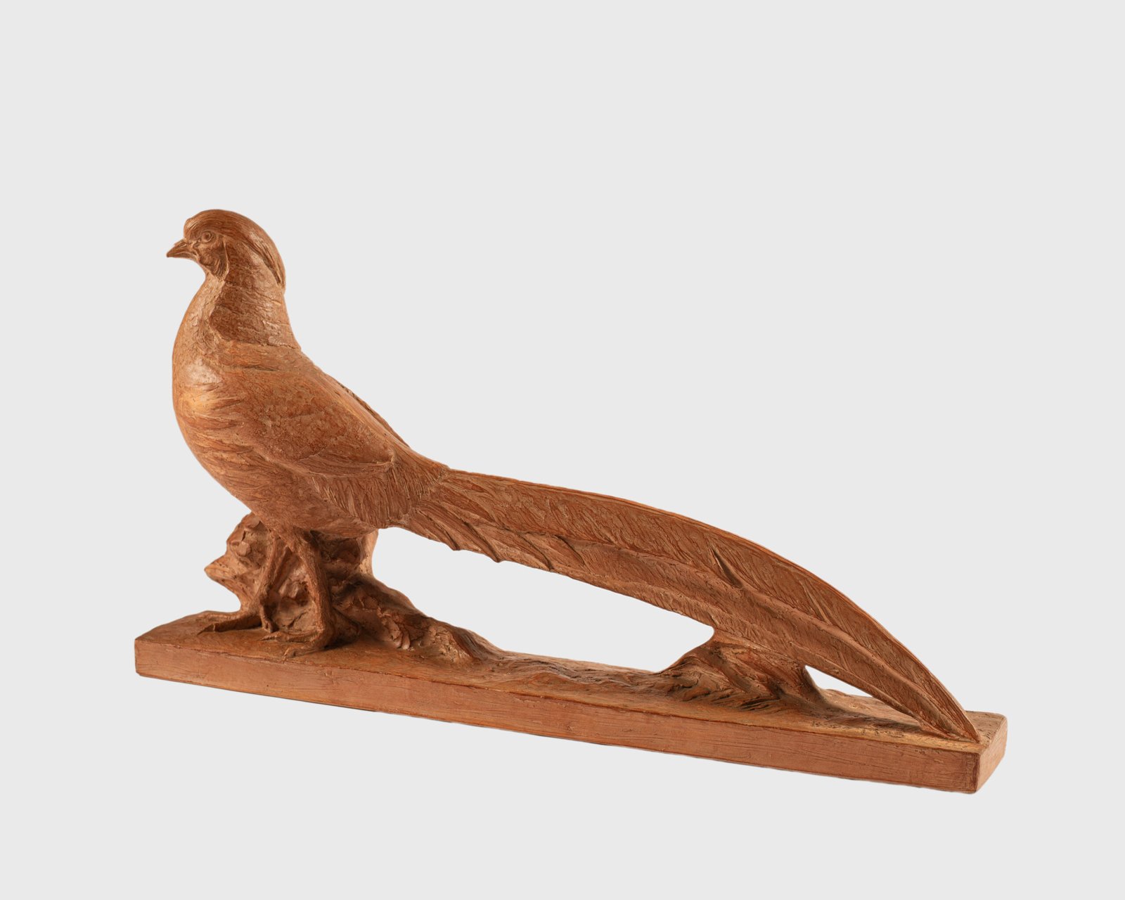 magnificent "Golden Pheasant" terracotta sculpture by Henri Bargas! Crafted by the renowned French sculptor in the 1920s, this stunning piece encapsulates the essence of Art Deco.