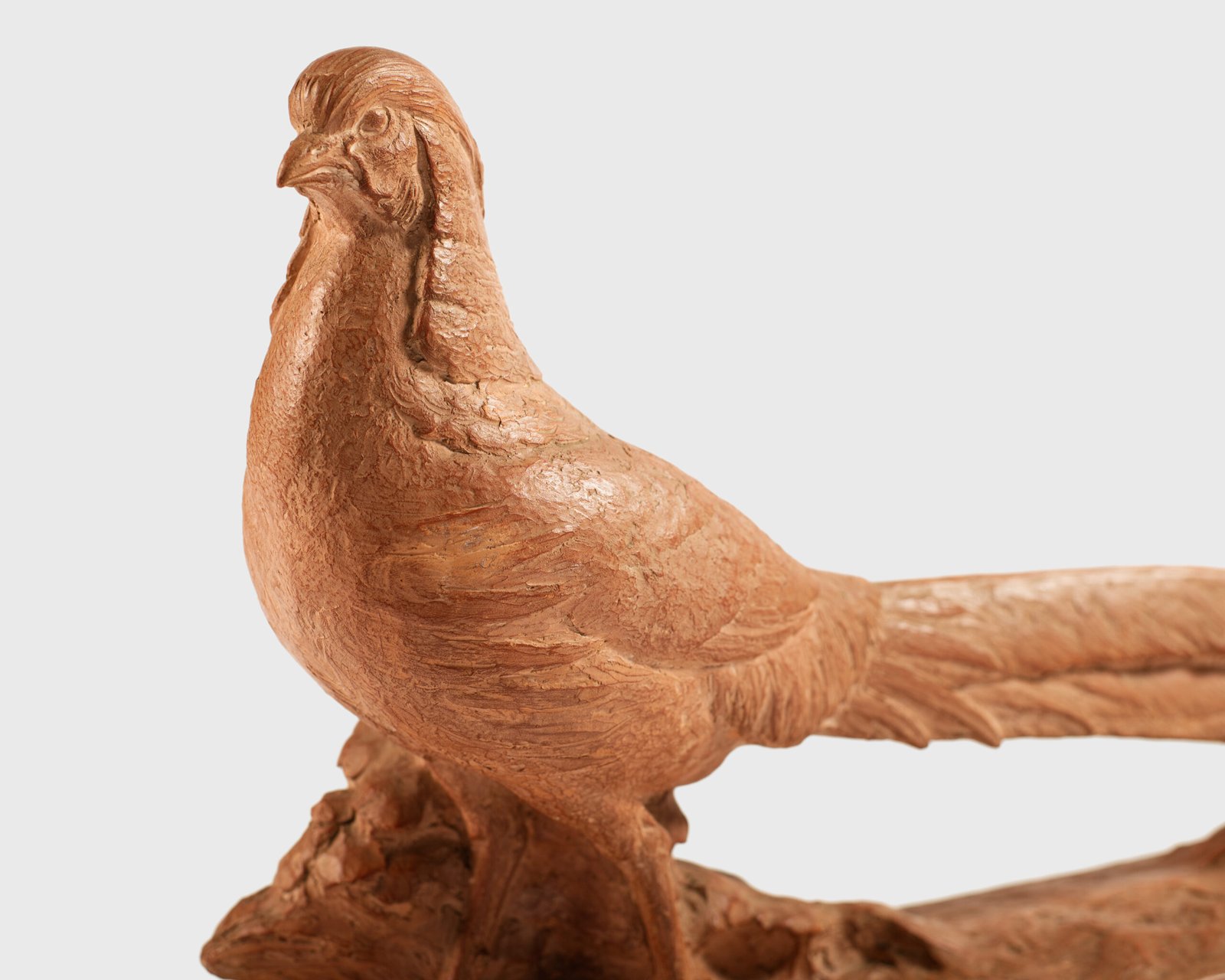 magnificent "Golden Pheasant" terracotta sculpture by Henri Bargas! Crafted by the renowned French sculptor in the 1920s, this stunning piece encapsulates the essence of Art Deco.