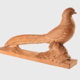 magnificent "Golden Pheasant" terracotta sculpture by Henri Bargas! Crafted by the renowned French sculptor in the 1920s, this stunning piece encapsulates the essence of Art Deco.