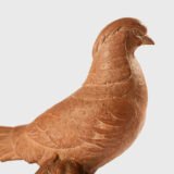 magnificent "Golden Pheasant" terracotta sculpture by Henri Bargas! Crafted by the renowned French sculptor in the 1920s, this stunning piece encapsulates the essence of Art Deco.