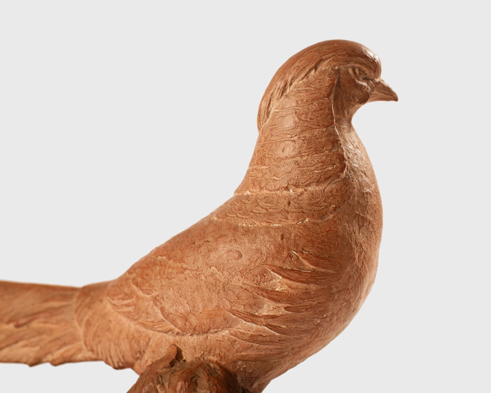 magnificent "Golden Pheasant" terracotta sculpture by Henri Bargas! Crafted by the renowned French sculptor in the 1920s, this stunning piece encapsulates the essence of Art Deco.