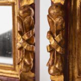 Antique pair of 18th century Spanish Baroque mirrors, carved and gilded wood. Immerse yourself in history with this exceptional pair of 18th century Spanish mirrors. Made of hand carved pine wood, these mirrors are notable for their rich high relief decorations.