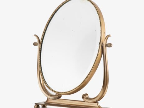 Italian Art Deco Bronze Lyre Mirror, a 1930's collector's item. Discover this refined Italian Art Deco bronze dressing table mirror, whose lyre design and beveled glass make it a unique piece full of character.