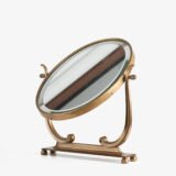 Italian Art Deco Bronze Lyre Mirror, a 1930's collector's item. Discover this refined Italian Art Deco bronze dressing table mirror, whose lyre design and beveled glass make it a unique piece full of character.