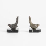 Hippolyte Moreau Art Deco Bookends, Cubist Birds in marble and spelter, 1930s This is an elegant pair of Art Deco bookends, signed by the celebrated French sculptor Hippolyte Moreau. These 1930s masterpieces depict two stylized birds with a bold cubist design.