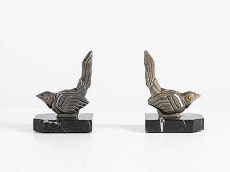 Hippolyte Moreau Art Deco Bookends, Cubist Birds in marble and spelter, 1930s This is an elegant pair of Art Deco bookends, signed by the celebrated French sculptor Hippolyte Moreau. These 1930s masterpieces depict two stylized birds with a bold cubist design.