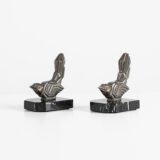 Hippolyte Moreau Art Deco Bookends, Cubist Birds in marble and spelter, 1930s This is an elegant pair of Art Deco bookends, signed by the celebrated French sculptor Hippolyte Moreau. These 1930s masterpieces depict two stylized birds with a bold cubist design.