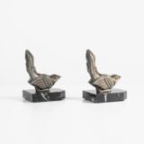 Hippolyte Moreau Art Deco Bookends, Cubist Birds in marble and spelter, 1930s This is an elegant pair of Art Deco bookends, signed by the celebrated French sculptor Hippolyte Moreau. These 1930s masterpieces depict two stylized birds with a bold cubist design.