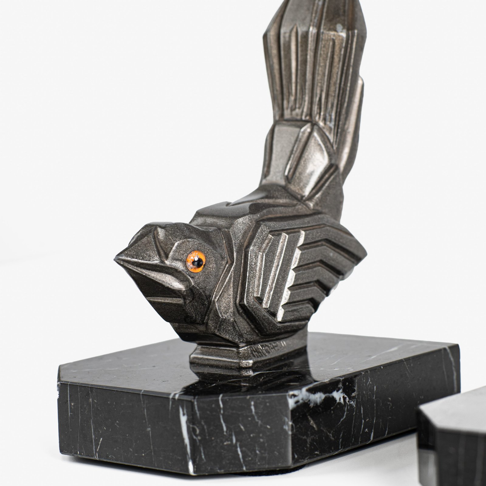 Hippolyte Moreau Art Deco Bookends, Cubist Birds in marble and spelter, 1930s This is an elegant pair of Art Deco bookends, signed by the celebrated French sculptor Hippolyte Moreau. These 1930s masterpieces depict two stylized birds with a bold cubist design.