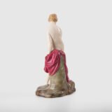 18th-century hard-paste porcelain sculpture titled “La Baigneuse”, modeled and signed in relief by Johann Peter Melchior, Höchst manufactory ca. 1775. Neoclassical nude figure with enamel decoration and fired gold detailing.