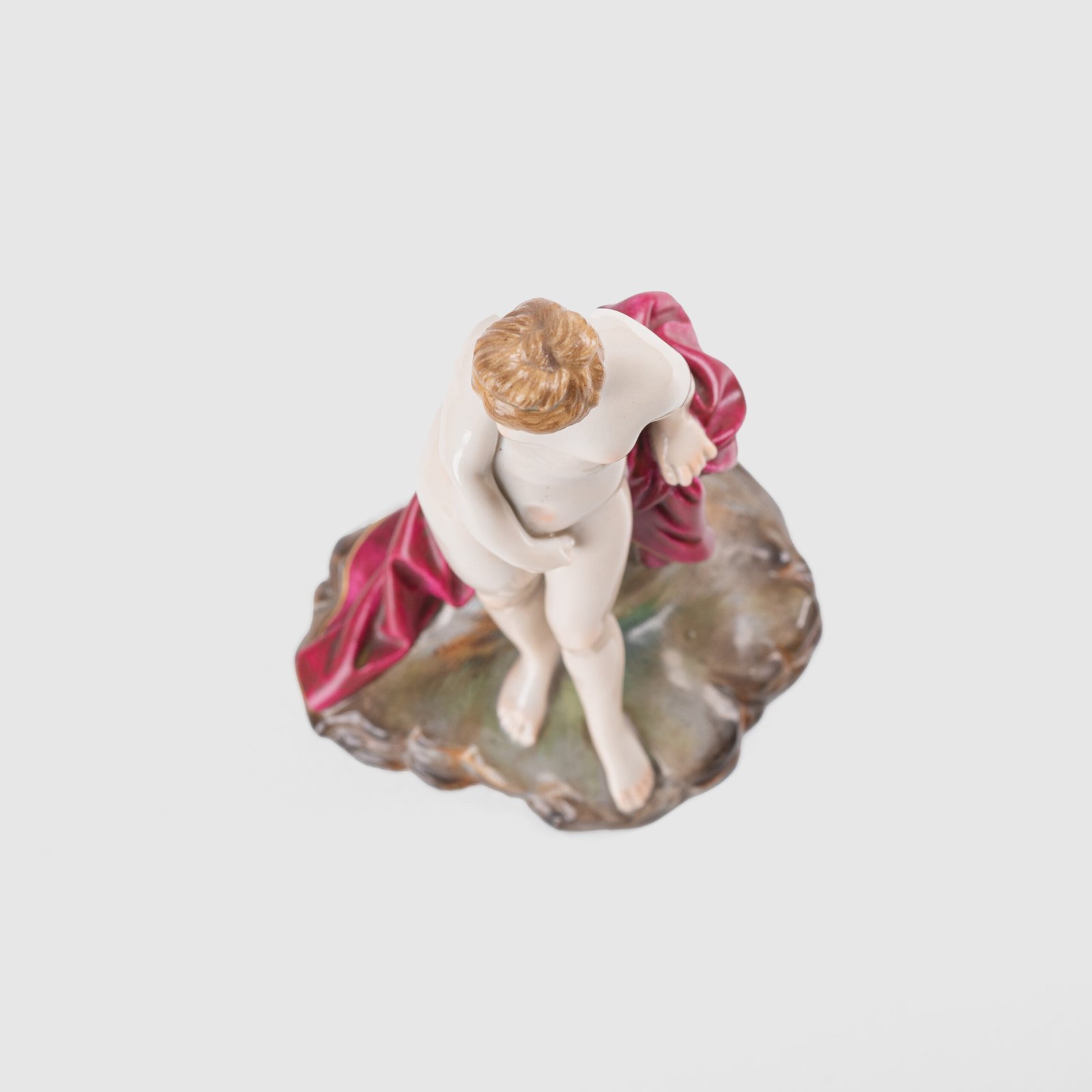 18th-century hard-paste porcelain sculpture titled “La Baigneuse”, modeled and signed in relief by Johann Peter Melchior, Höchst manufactory ca. 1775. Neoclassical nude figure with enamel decoration and fired gold detailing.