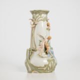 Antique German Art Nouveau Porcelain Vase by Karl Ens – Cupid and Maiden – Hand Painted, ca. 1900 This exceptional German Art Nouveau porcelain vase was crafted by Karl Ens Porzellanmanufaktur in the early 20th century, around 1900–1910. An exquisite example of Jugendstil decorative art. Dimensions: • Height: 15.7 in • Diameter: 9.1 in