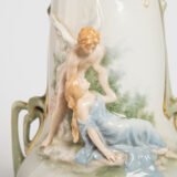 Antique German Art Nouveau Porcelain Vase by Karl Ens – Cupid and Maiden – Hand Painted, ca. 1900 This exceptional German Art Nouveau porcelain vase was crafted by Karl Ens Porzellanmanufaktur in the early 20th century, around 1900–1910. An exquisite example of Jugendstil decorative art. Dimensions: • Height: 15.7 in • Diameter: 9.1 in
