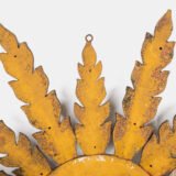 Elegant sunburst mirror hand-carved in elm and gilded with gold leaf, made in Viana do Castelo (Portugal) circa 1920–1930. Original mirror, refined patina, and exceptional craftsmanship.