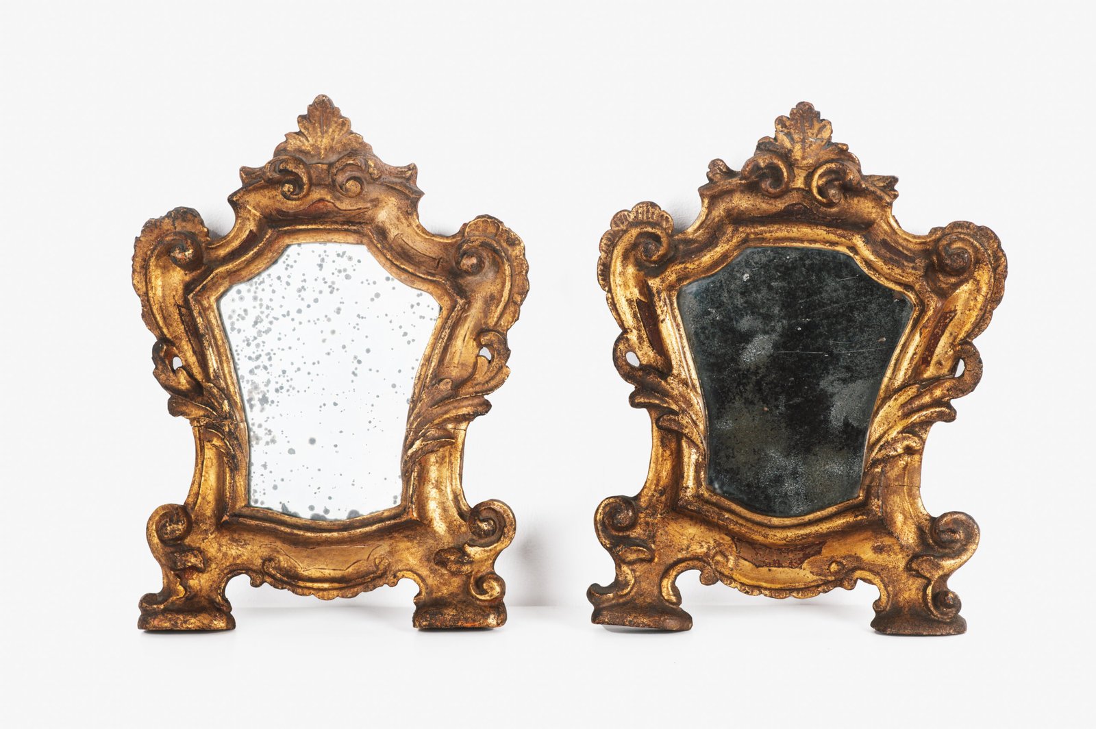 “Pair of 18th-century Italian Baroque devotional frames (cartas de gloria) with hand-carved wood, original gold leaf gilding, and mercury glass mirrors, Lombard-Venetian school.”
