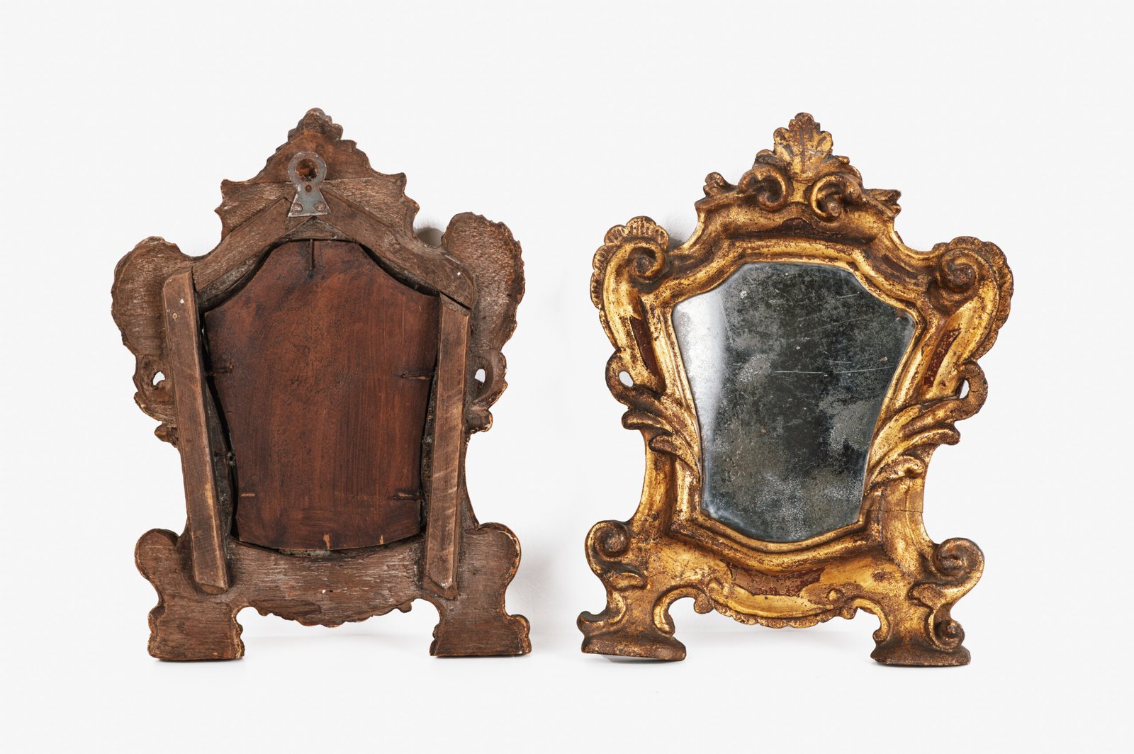 “Pair of 18th-century Italian Baroque devotional frames (cartas de gloria) with hand-carved wood, original gold leaf gilding, and mercury glass mirrors, Lombard-Venetian school.”