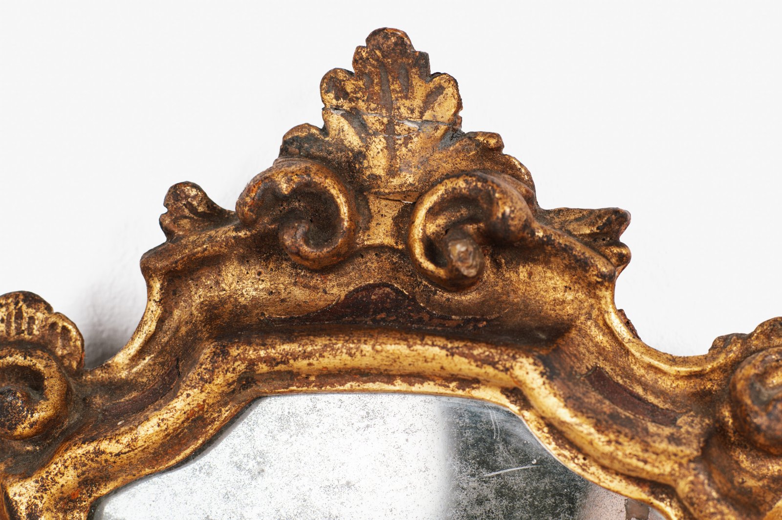 “Pair of 18th-century Italian Baroque devotional frames (cartas de gloria) with hand-carved wood, original gold leaf gilding, and mercury glass mirrors, Lombard-Venetian school.”