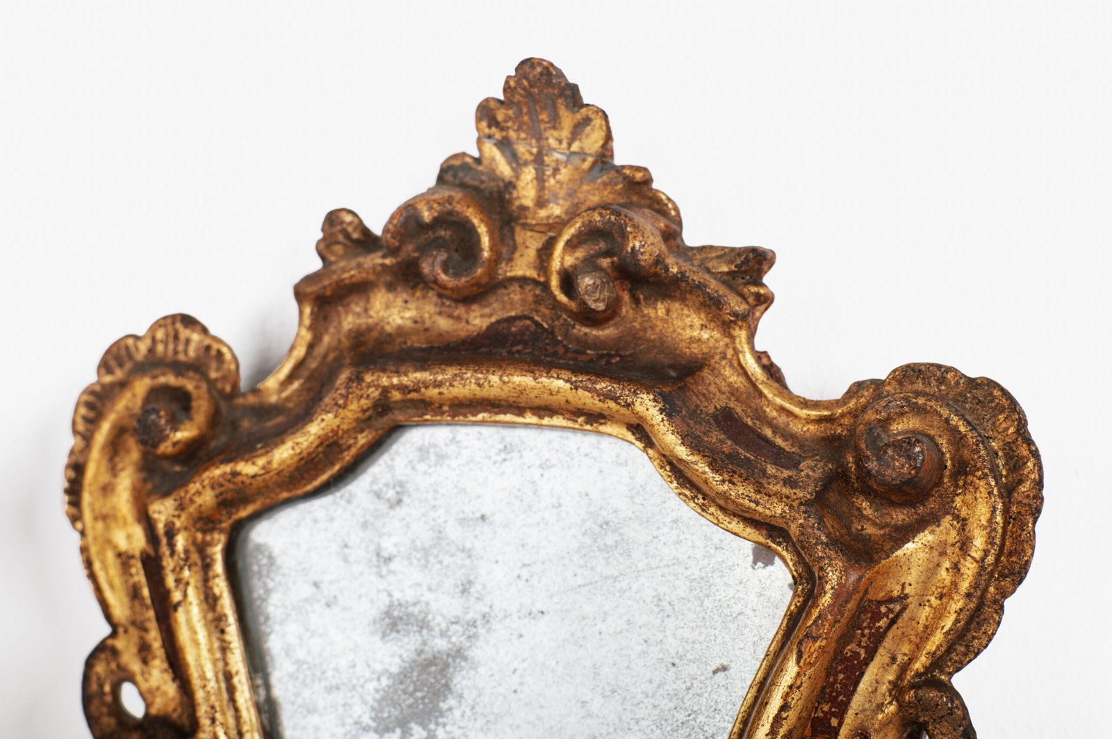 “Pair of 18th-century Italian Baroque devotional frames (cartas de gloria) with hand-carved wood, original gold leaf gilding, and mercury glass mirrors, Lombard-Venetian school.”
