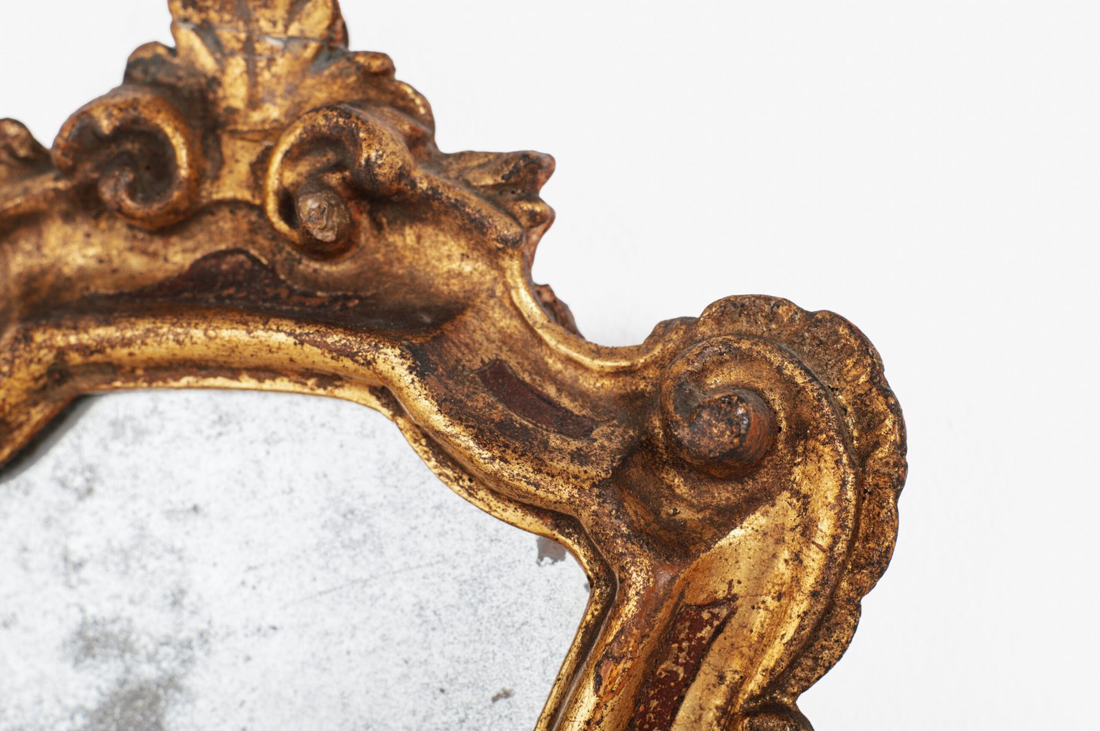 “Pair of 18th-century Italian Baroque devotional frames (cartas de gloria) with hand-carved wood, original gold leaf gilding, and mercury glass mirrors, Lombard-Venetian school.”