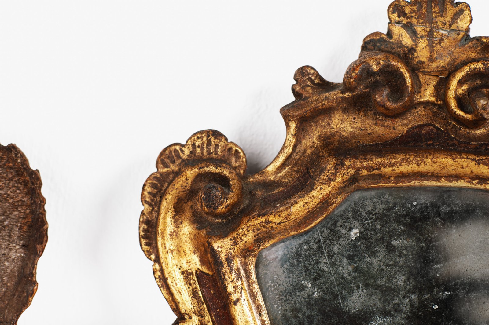 “Pair of 18th-century Italian Baroque devotional frames (cartas de gloria) with hand-carved wood, original gold leaf gilding, and mercury glass mirrors, Lombard-Venetian school.”