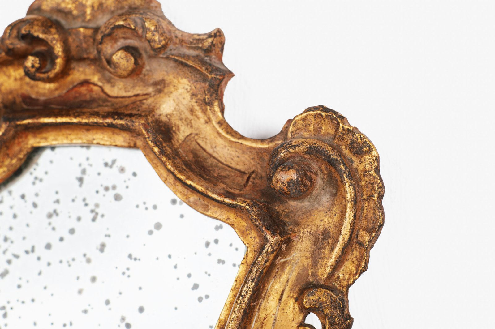 “Pair of 18th-century Italian Baroque devotional frames (cartas de gloria) with hand-carved wood, original gold leaf gilding, and mercury glass mirrors, Lombard-Venetian school.”