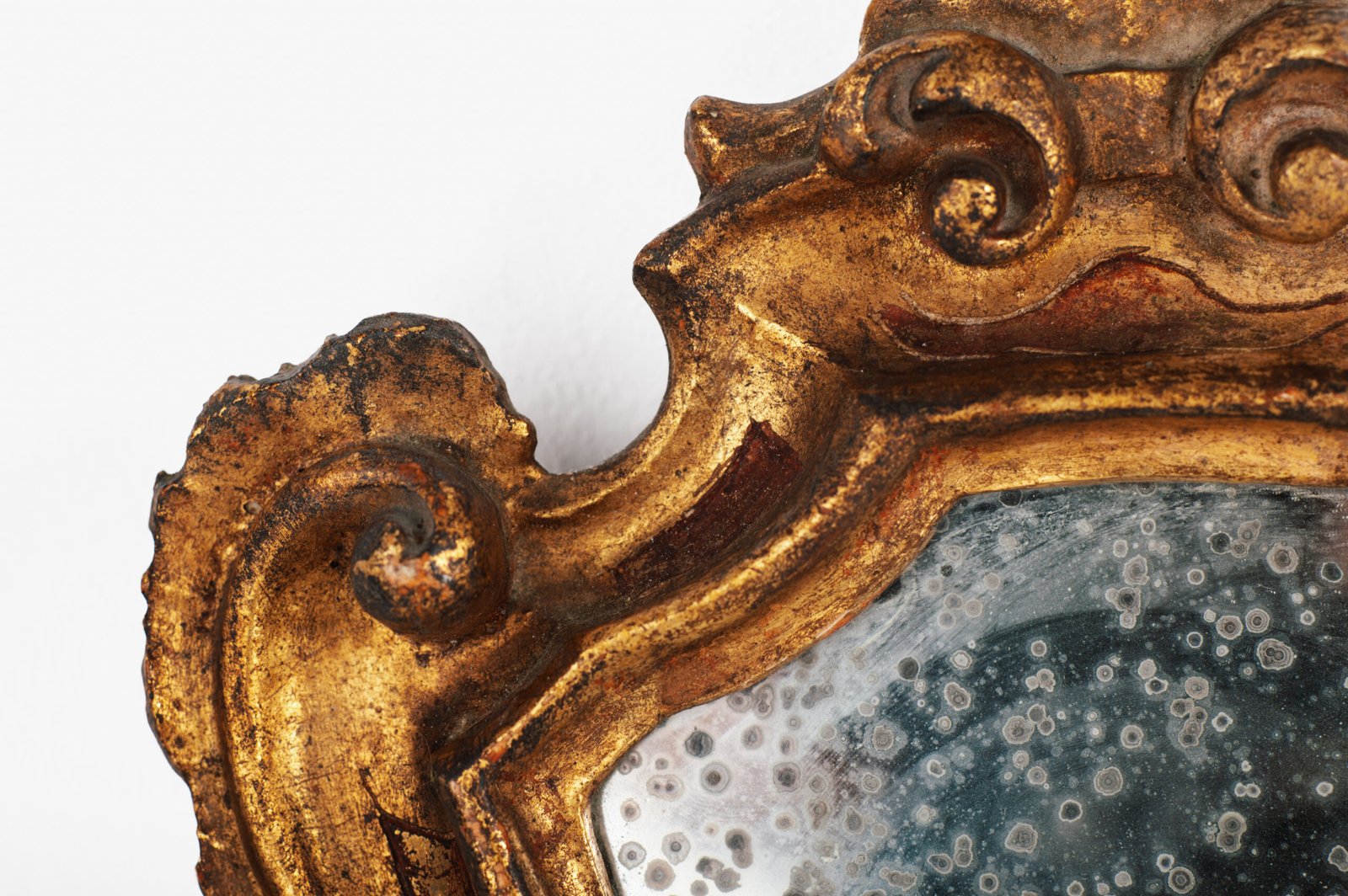 “Pair of 18th-century Italian Baroque devotional frames (cartas de gloria) with hand-carved wood, original gold leaf gilding, and mercury glass mirrors, Lombard-Venetian school.”