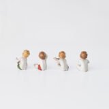 Delicate set of four hand-painted porcelain putti musicians crafted by the Höchst manufactory in Germany, circa 1767–1779. Each figure depicts a different musical instrument and bears the distinctive Höchst wheel mark with radiating spokes. Approx. 1.77 × 1.77 × 1.18 in. A fine example of late Rococo artistry.