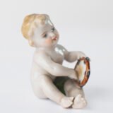 Delicate set of four hand-painted porcelain putti musicians crafted by the Höchst manufactory in Germany, circa 1767–1779. Each figure depicts a different musical instrument and bears the distinctive Höchst wheel mark with radiating spokes. Approx. 1.77 × 1.77 × 1.18 in. A fine example of late Rococo artistry.