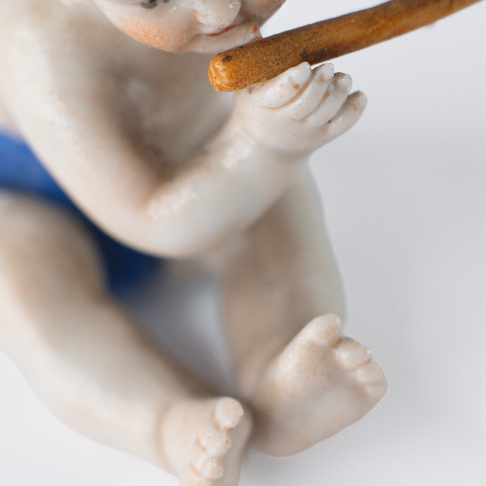 Delicate set of four hand-painted porcelain putti musicians crafted by the Höchst manufactory in Germany, circa 1767–1779. Each figure depicts a different musical instrument and bears the distinctive Höchst wheel mark with radiating spokes. Approx. 1.77 × 1.77 × 1.18 in. A fine example of late Rococo artistry.